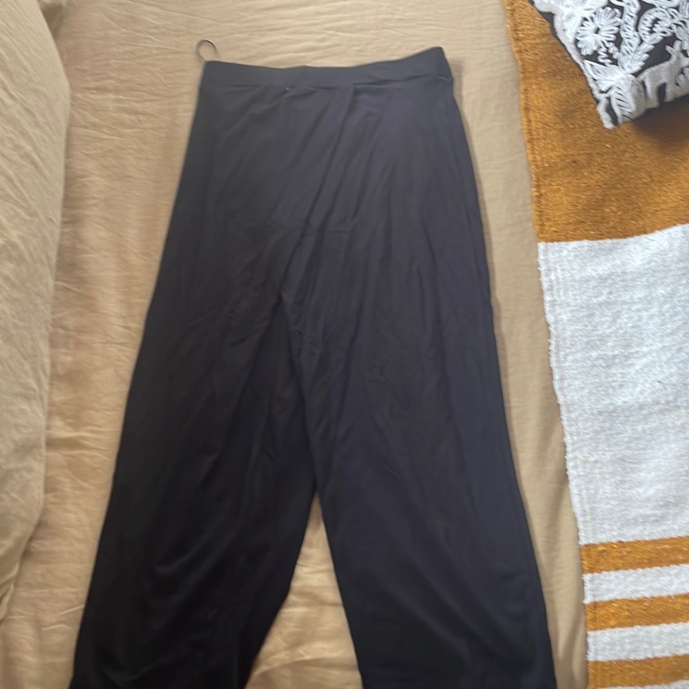 Cute black cotton pant, crosses over in front. Brand new, never worn!